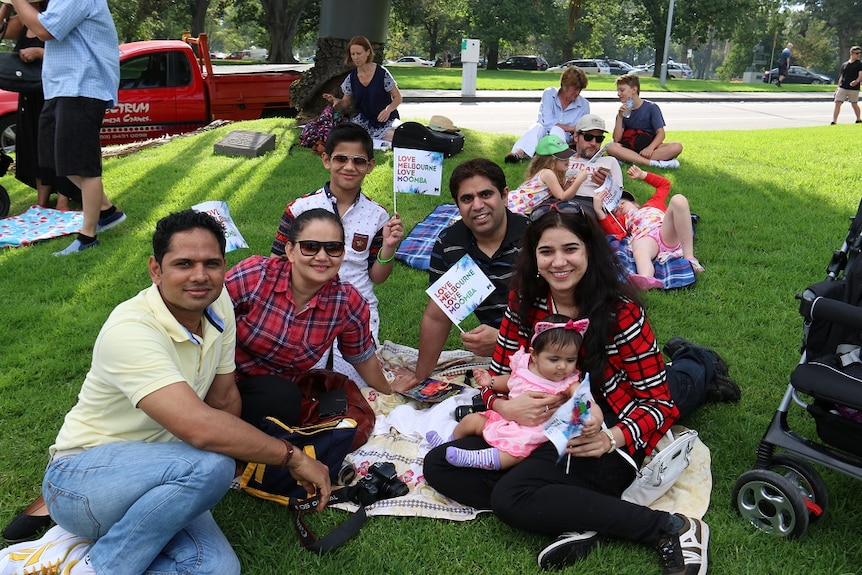 The Dagar and Chaudhary families watch the Moomba parade