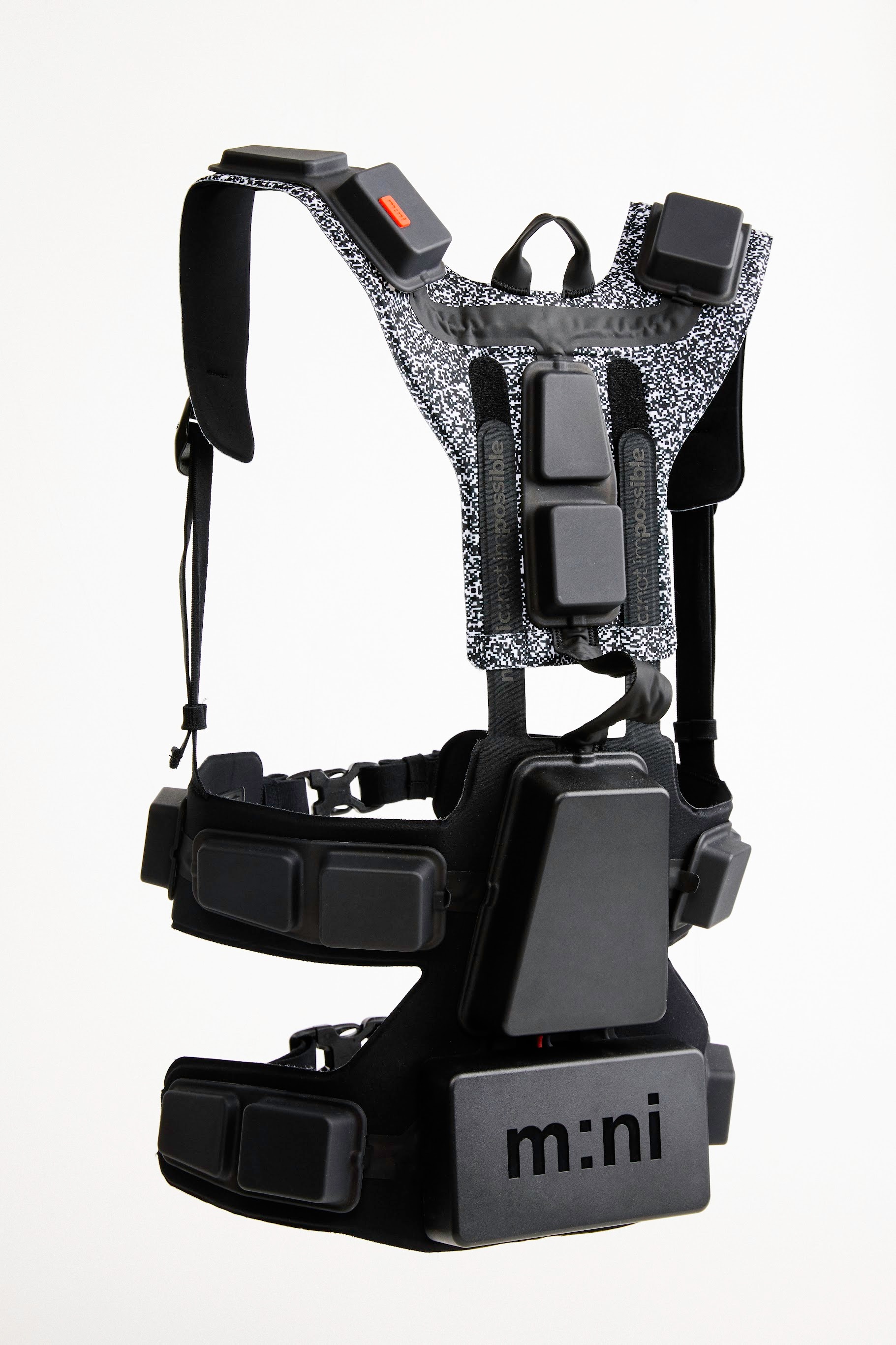 A generic photo of a futuristic-looking haptic vest, with black shoulder straps and a small black box attached at the back.