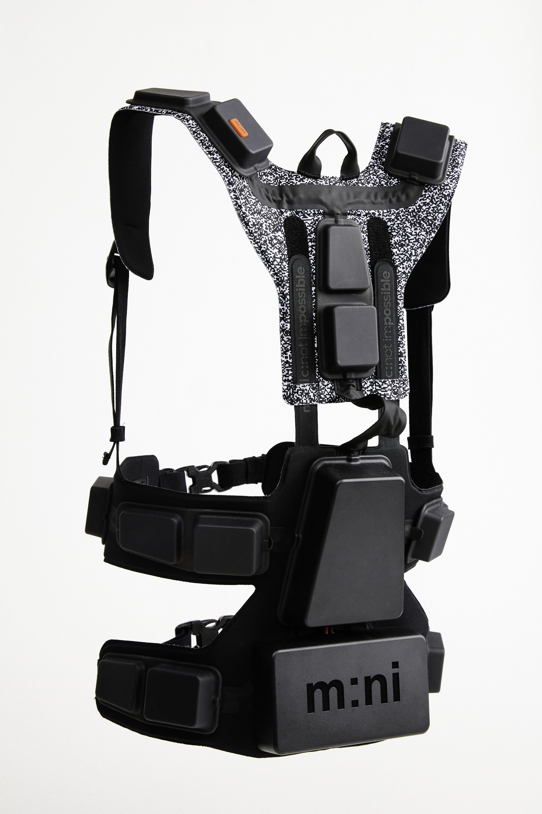 A generic photo of a futuristic-looking haptic vest, with black shoulder straps and a small black box attached at the back.