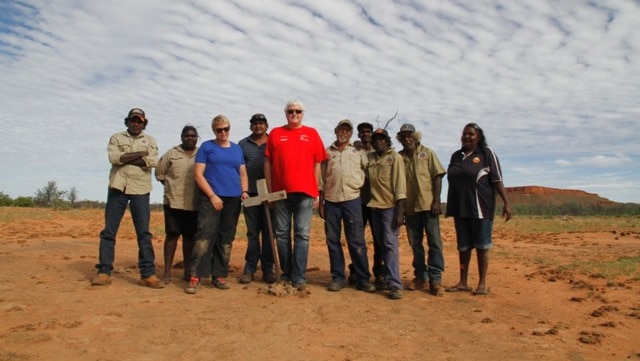 Group photo near grave