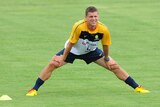 Jason Culina stretches during a Socceroos training session at Carrara Stadium on February 25, 2010