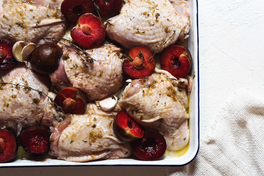Chicken tray bake with plums, lemon and thyme recipe uncooked