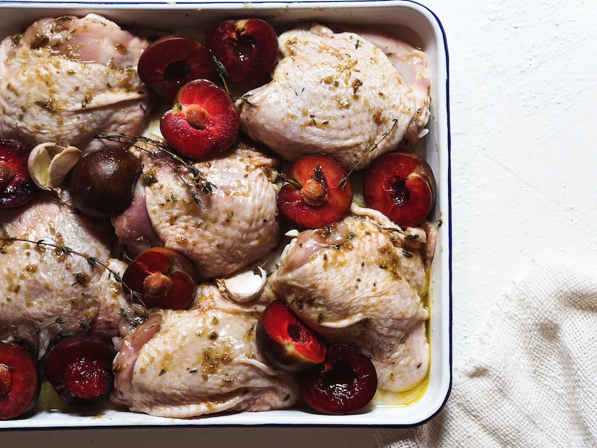 Chicken tray bake with plums, lemon and thyme recipe uncooked