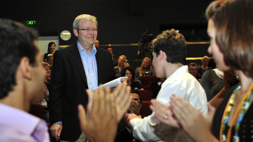 Mr Rudd addressed the summit after returning home from his world tour.