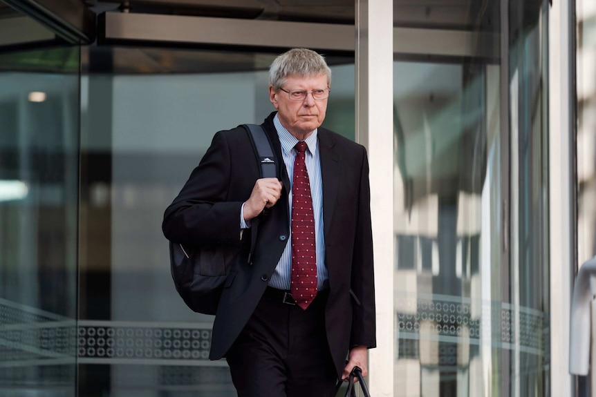 Dr Clive Cooke walking out of court at the Claremont serial killer trial