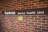 Banksia Mental Health Unit sign on a brick wall