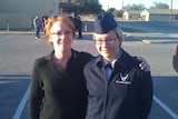 A blonde Reality Winner in a US air force outfit stands next to her mother.