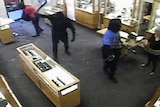 CCTV footage shows a violent armed robbery at a Toorak jewellery store