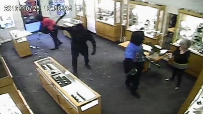 CCTV footage shows a violent armed robbery at a Toorak jewellery store