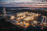 An aerial view of the Pluto LNG plant at night.