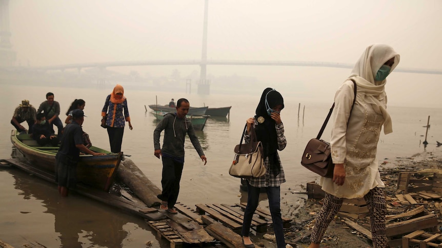 Haze shrouded Batanghari River on Indonesia's Sumatra island