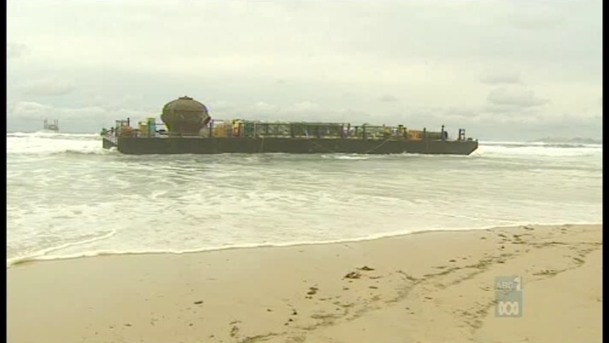 The barge broke its moorings near the desalination platform at Tugun in strong winds and heavy seas.