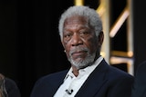 Morgan Freeman looks ahead while participating in a National Geographic panel.