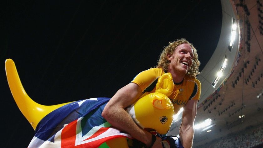 Steve Hooker, and friend, celebrates winning gold in the men's pole vault final