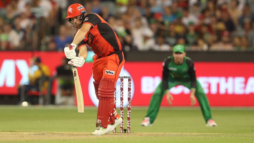 Aaron Finch plays defensively for the Renegades against the Stars in the Big Bash League at the MCG.