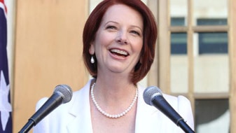 Julia Gillard in a white jacket with pearls (Getty Images: Cole Bennetts)