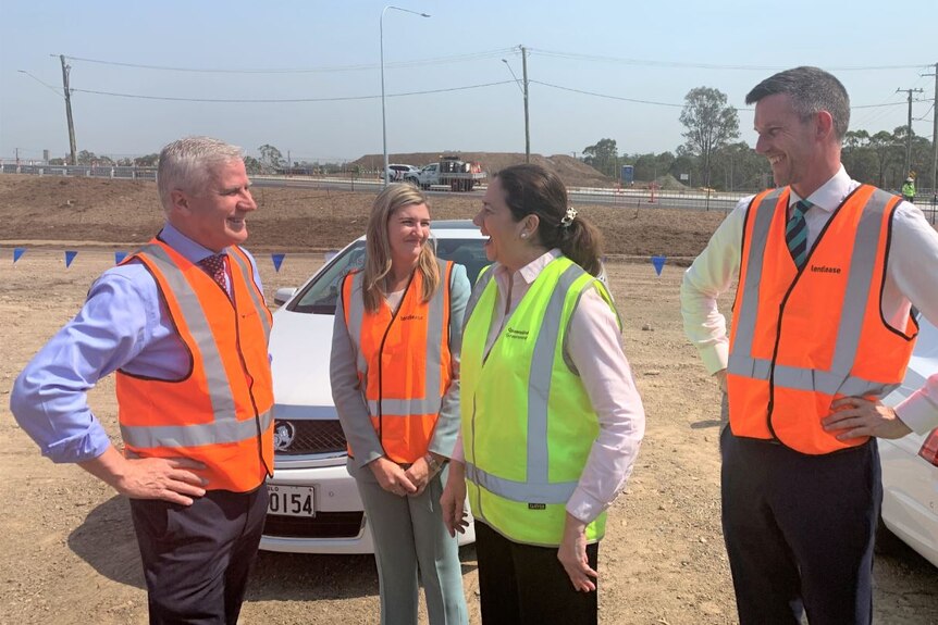 Deputy PM Michael McCormack, Qld MPs Shannon Fentiman and Mark Bailey, and Qld Premier Annastacia Palaszczuk share a laugh
