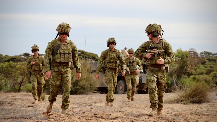 Defence recruiting soars as Australians look work amid downturn - ABC