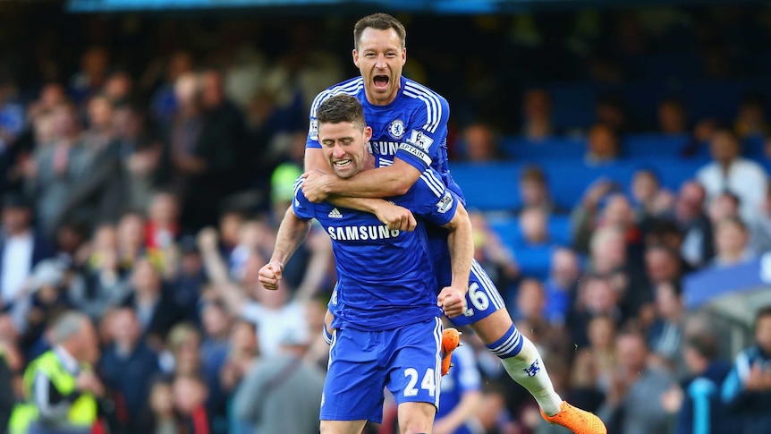 John Terry celebrates Chelsea win over Manchester United with Gary Cahill
