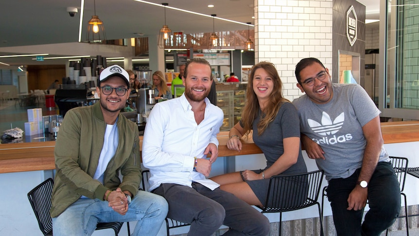 A group of masters students at a cafe in Brisbane.