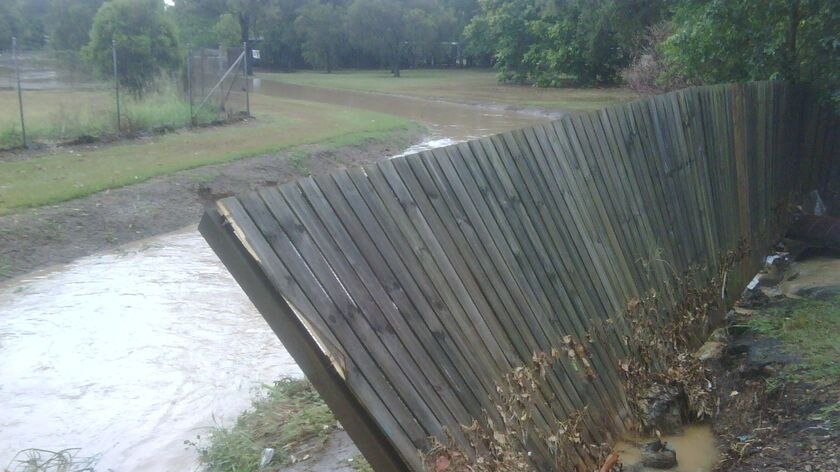 Flash flooding has caused havoc at Goodna with local roads cut by water this afternoon.