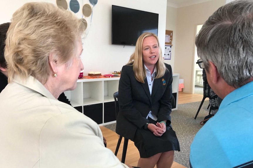 Carrie Dickinson speaks with residents at Kemira