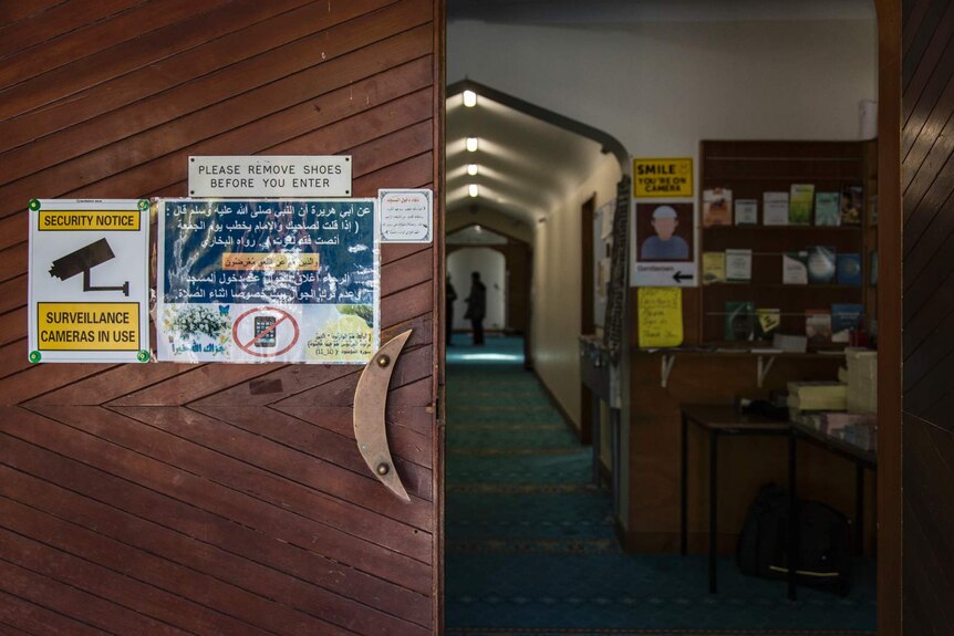 The entrance to the Al Noor mosque with signs warning of security cameras in place