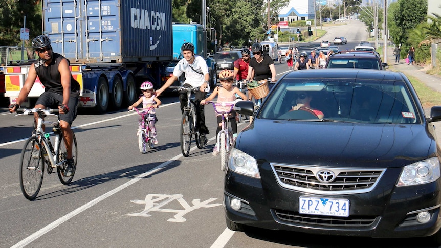 A group of cyclists riding together in Yarraville.