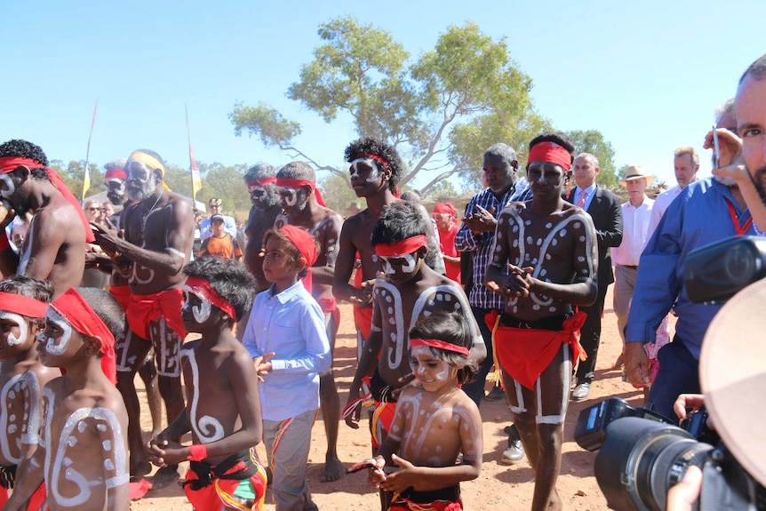Aboriginal dancers lead the ceremony at Kenbi