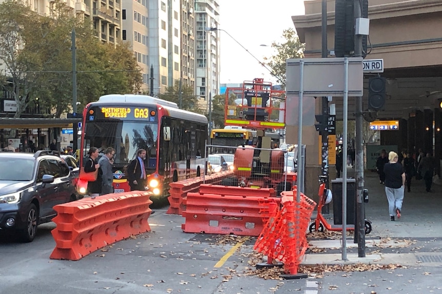 Buses on a busy city street