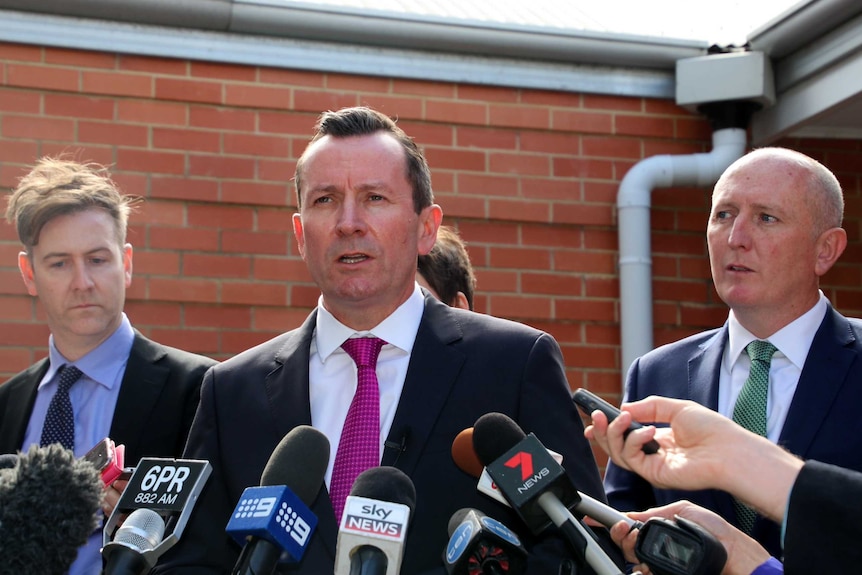 Premier Mark McGowan with reporters in Perth