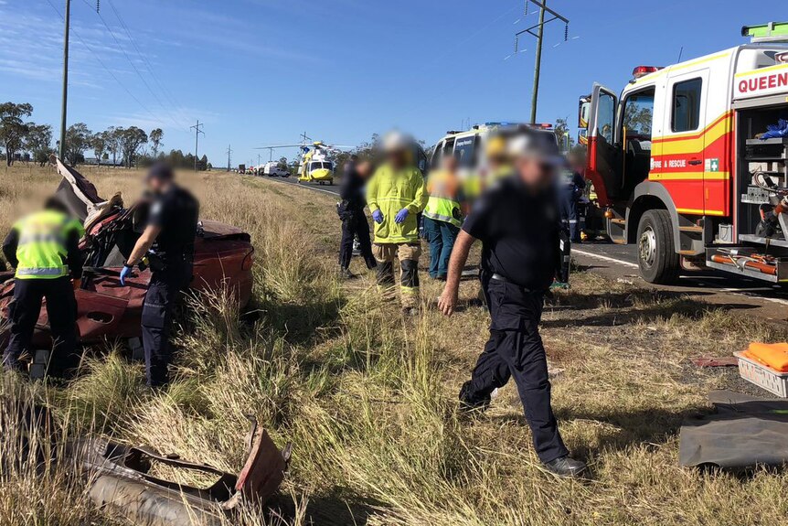 Emergency workers at scene of coal train collision near Westwood, west of Rockhampton
