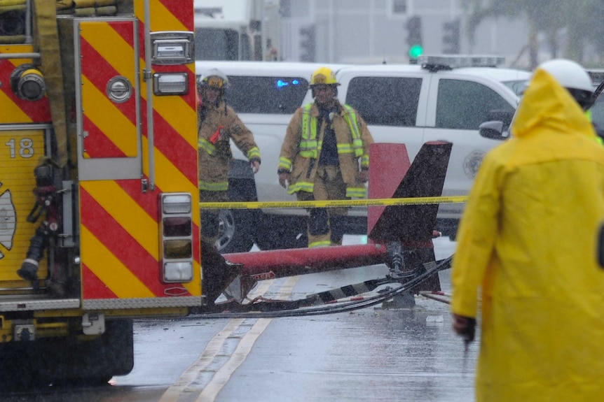 A portion of the tail section of a helicopter is shown after crashing in Kailua, Hawaii, Monday, April 29, 2019.