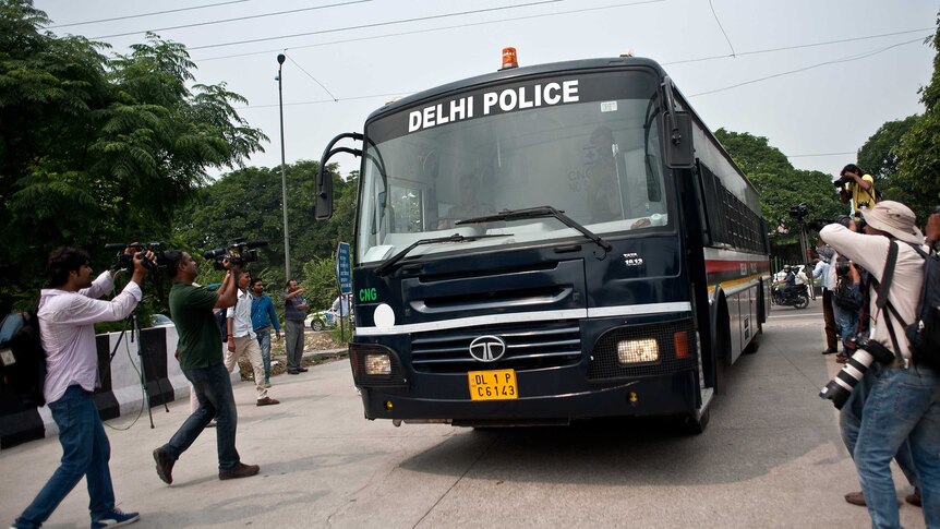 Indian police van believed to be carrying the accused in a gang rape case arrives at court in New Delhi