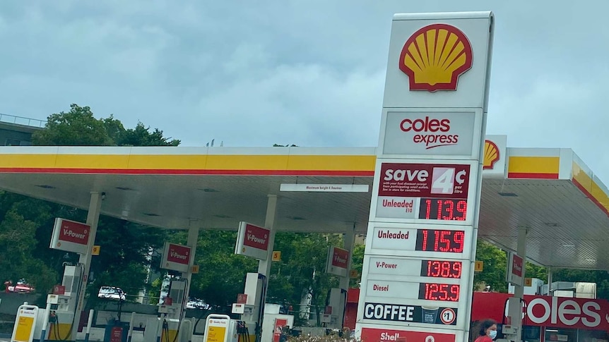 A service station sign offers unleaded petrol for $1.14 and $1.16 a litre in Sydney