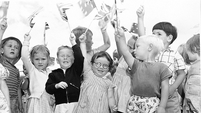 Young fans greet the Queen