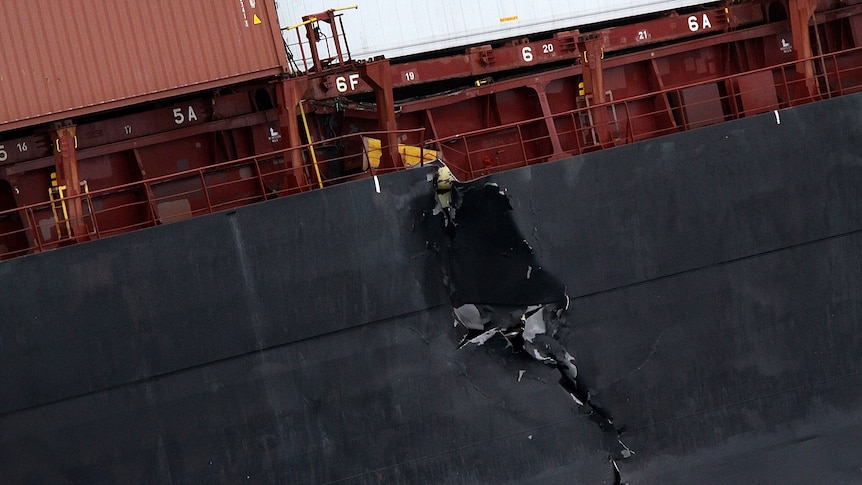 A crack in the hull of the Liberian container ship Rena
