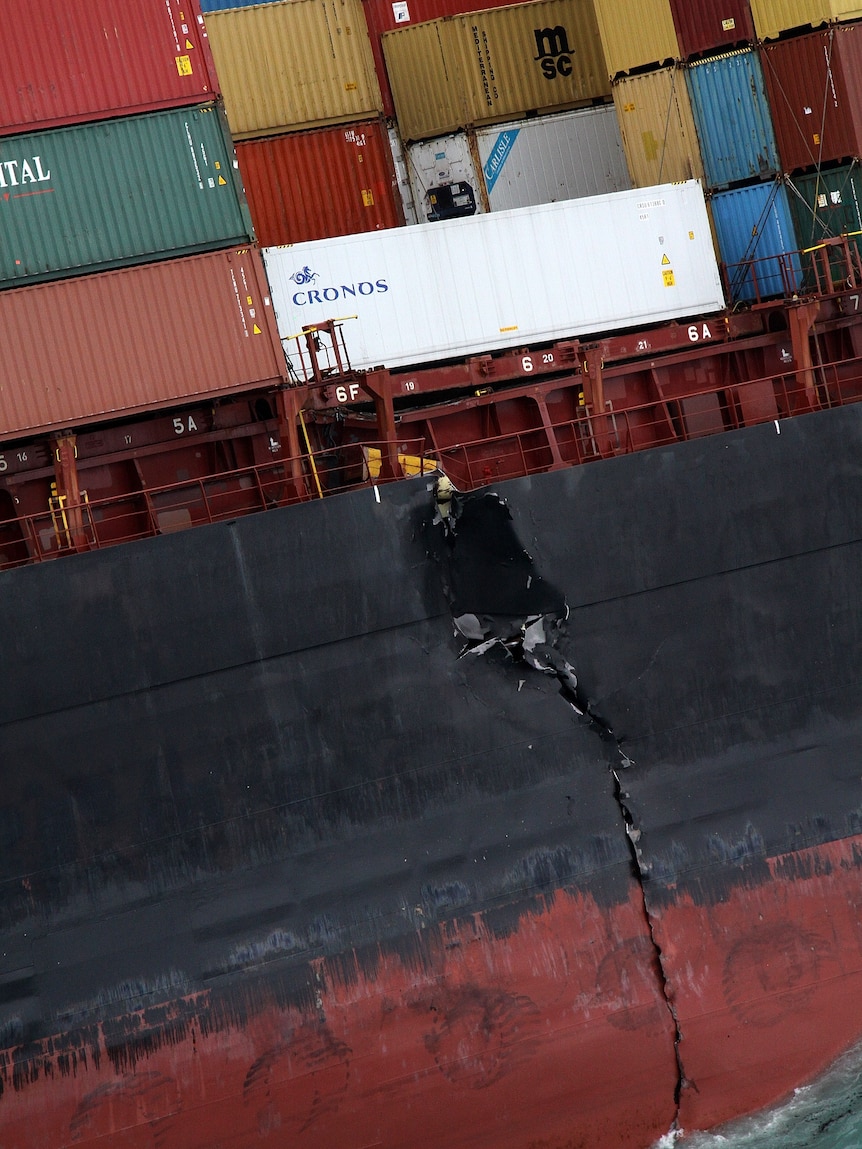 A crack in the hull of the Liberian container ship Rena