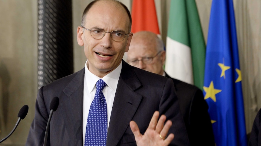 Italian prime minister Enrico Letta answers journalists at the Quirinale presidential palace.