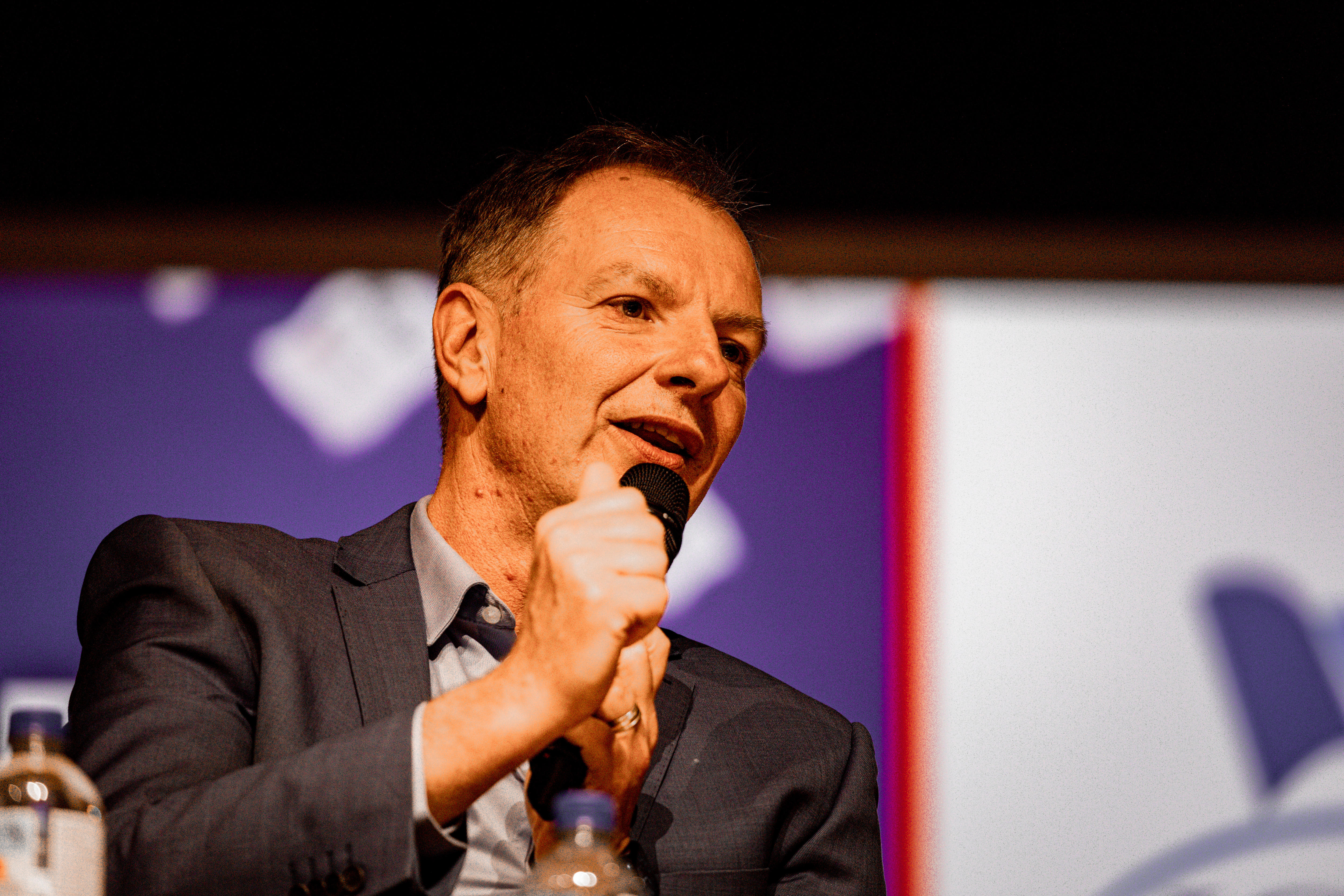 A man with a microphone.