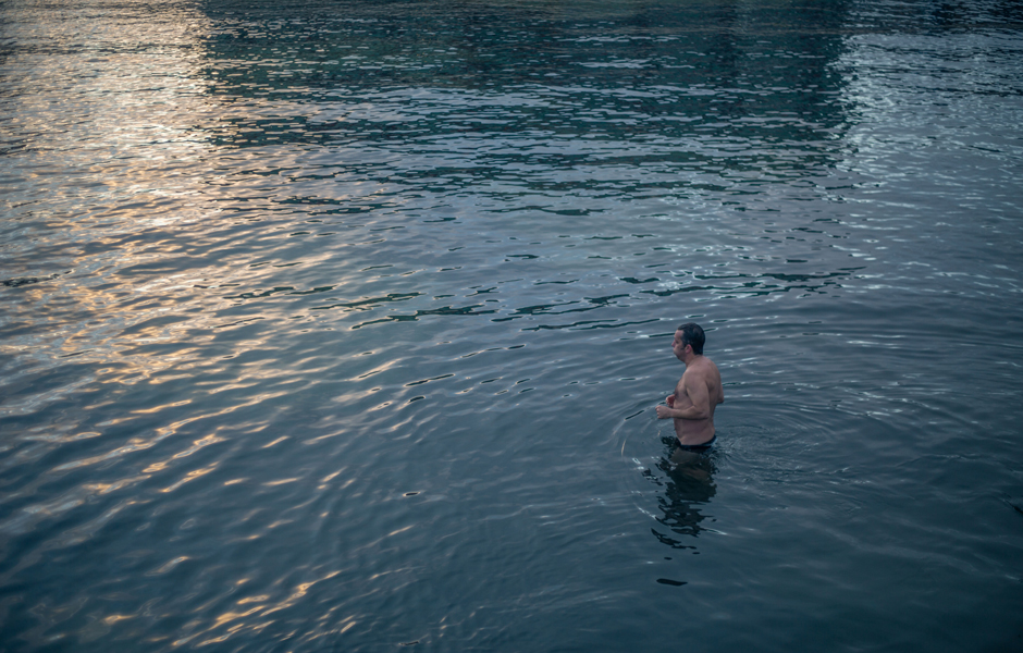 An Iceberger member prepares for his morning swim.