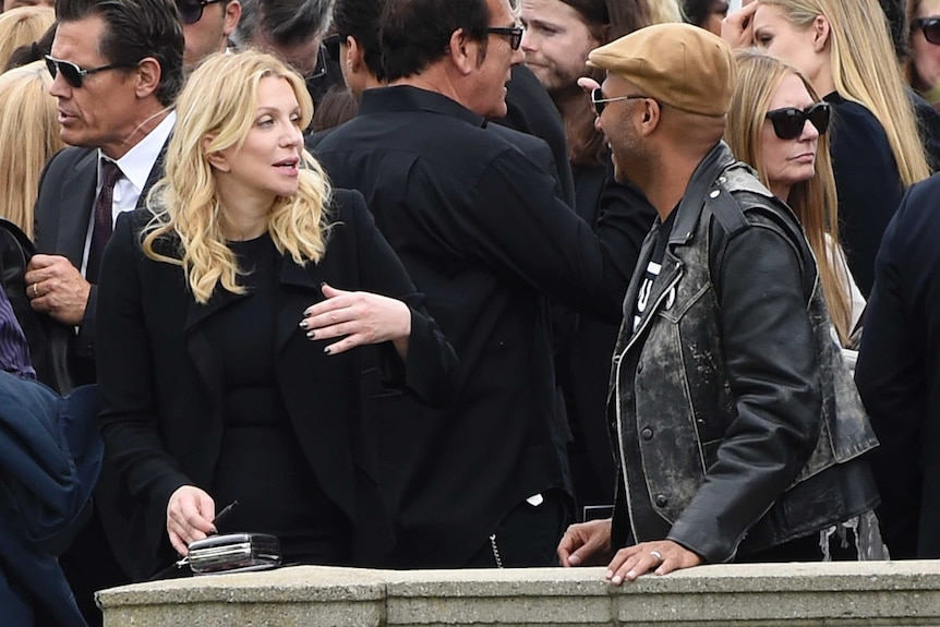 Courtney Love talks to Tom Morello at Chris Cornell's funeral.
