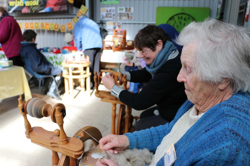 Isabel Black displays her spinning skills at Sheepvention in Hamilton