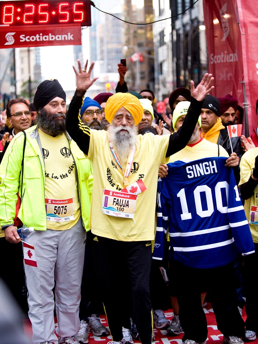 Inspirational British Sikh, 100 year-old Fauja Singh as he completes the 42.2km 2011 Scotiabank Toronto Waterfront Marathon
