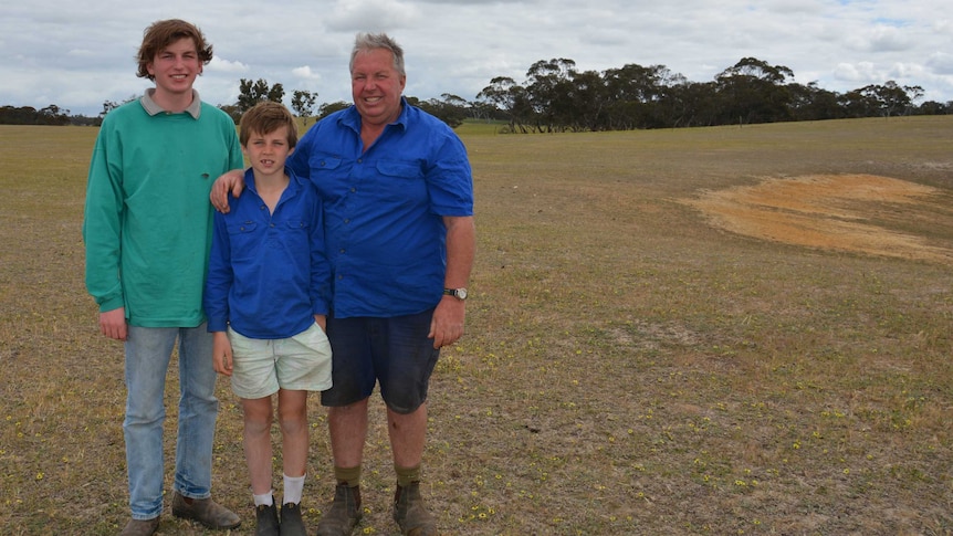 Farmer Miles Hannemann and sons Edward and Charlie