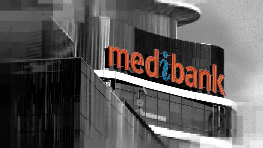 A sign on a building that says Medibank. The image is black and white except for the word. There is pixelation on the edges.