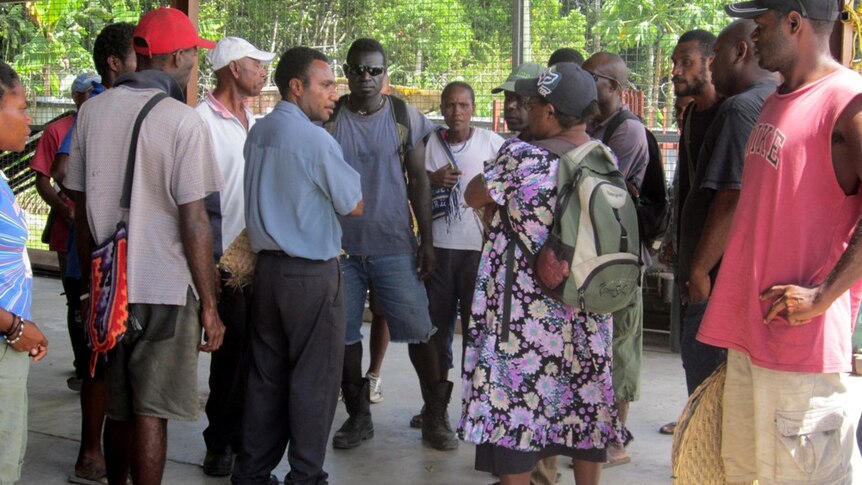 Family members and relatives of the passengers on board the Rabaul Queen wait for news after the ferry sank.