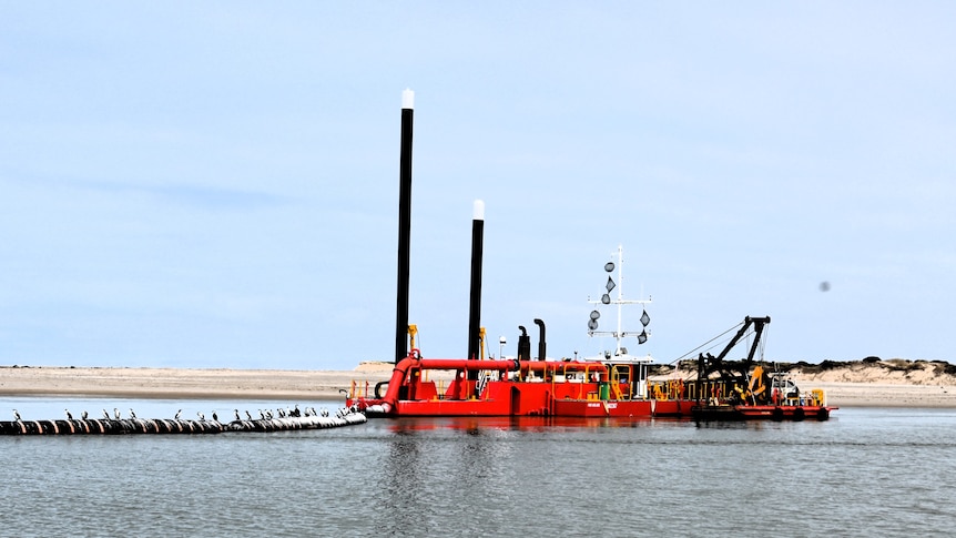 A red dredger at the River Murray 