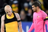 Socceroos Aaron Mooy and Mat Ryan after a 2018 FIFA World Cup qualifier.