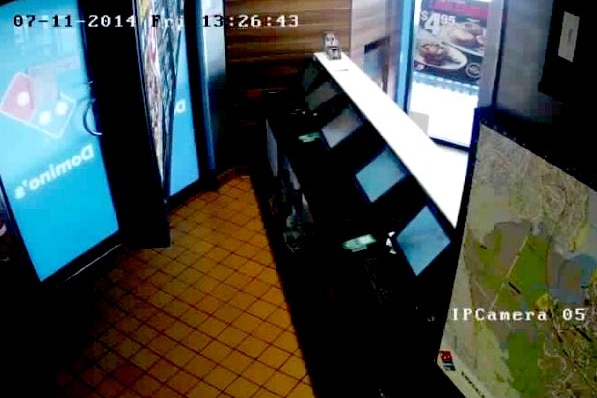 Security camera footage from a Domino's Pizza store
